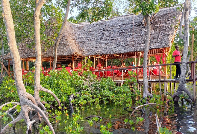 Enjoy signature crab samosas, fresh seafood, and stunning sunset views