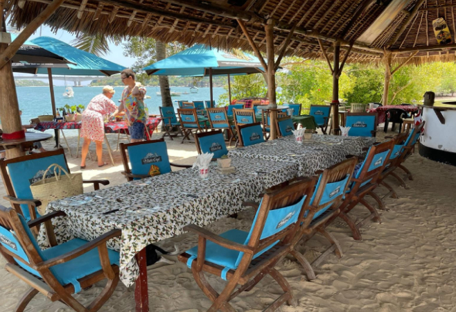 A charming restaurant at the Mnarani boatyard, Kilifi Boatyard, with fresh seafood and scenic creek views in a relaxed, nautical atmosphere