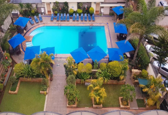 In the heart of the city, Merica Hotel offers a tranquil oasis with an outdoor pool and a serene garden In the heart of the city, Merica Hotel offers a tranquil oasis with an outdoor pool and a serene garden