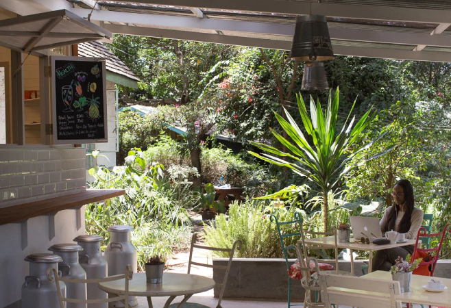 Tin Roof Café is a gorgeous little place with floral cushions, spindly garden chairs, tin pots of wildflowers, and mismatched pictures on the walls Tin Roof Café is a gorgeous little place with floral cushions, spindly garden chairs, tin pots of wildflowers, and mismatched pictures on the walls